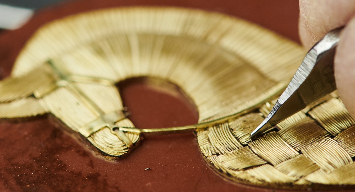 The Slim d'Hermès Masan Masan boasts oriental horsehair marquetry