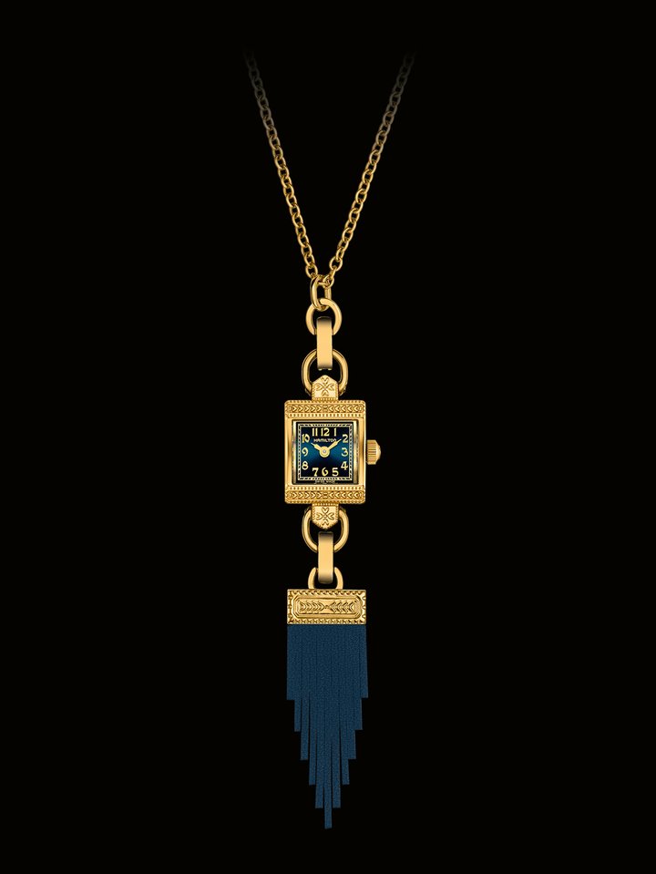 Hamilton – American Classic Lady Hamilton Necklace: Wearing a watch as a necklace is a tradition that Hamilton revives with the Lady Hamilton Necklace. The epitome of 1930s Art Deco style, it can be worn as part of a necklace or as a timepiece paired with a delicate chain bracelet. Three versions are available: stainless steel, yellow gold or rose gold PVD. Each Lady Hamilton Necklace comes with an adjustable chain and a fringed tassel pendant in forest green, midnight blue, or red burgundy. $