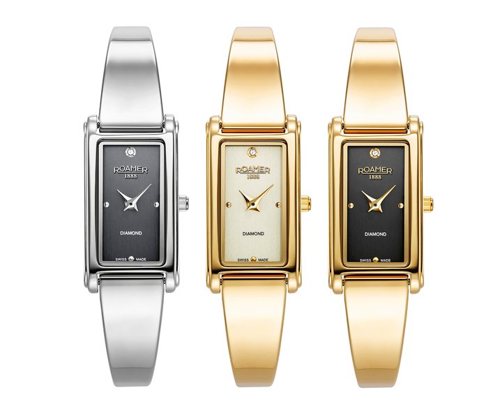 In stainless steel or gold-toned, the Elegance Diamond's dagger-shaped hands, hour markers, delicate fluted crown and the setting for the diamond complement the case and bracelet.